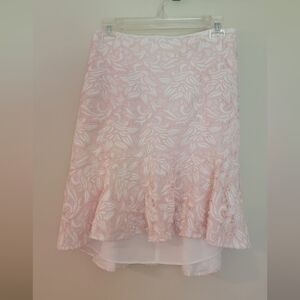 Knee length pink lace skirt
